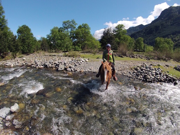 Horse riding river crossing Pucon