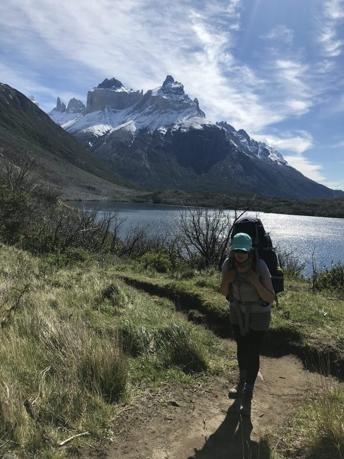 Solo woman hiking in Torres Del Paine