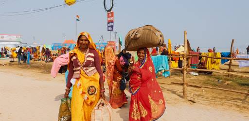 Friendly female travellers at the kumbh Traveling Honeybird