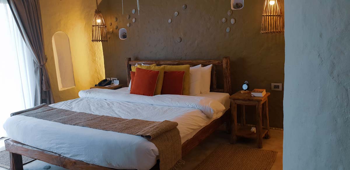 Giant bed in my room at barahi Jungle Lodge