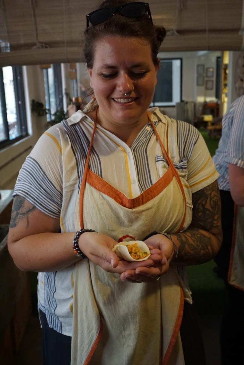 Ashley enjoying her vegan momo